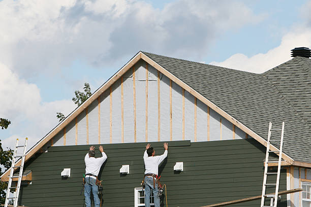Professional Siding Replacement technician working in Long Beach, IN